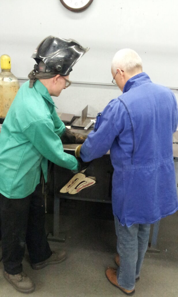 Working with welder while testing a PQR